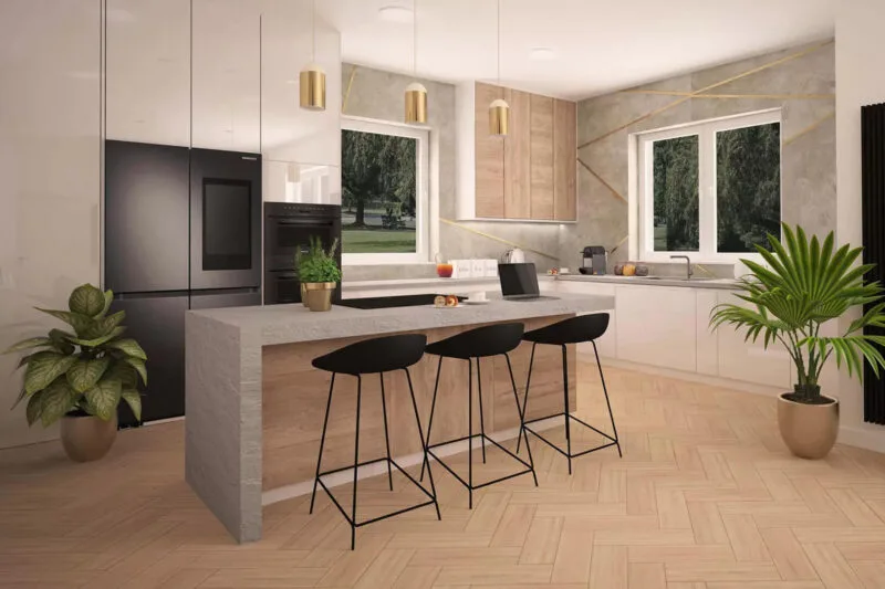 Jasna kuchnia. Na środku betonowa wysepka kuchenna z trzema czarnymi krzesłami. Jasna drewniana podłoga. Czarne wyposażenie kuchni i szare szafki i zlew. Dwie duże rośliny w złotych donicach. Trzy stożkowate, złote lapy. I dwa okna z widokiem na ogród.