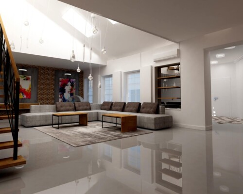 Komfort i design na otwartym planie – strefa relaksu w sercu wielopoziomowego domu. Ujęcie na strefę wypoczynkową w nowoczesnym salonie z widokiem na antresolę i schody.