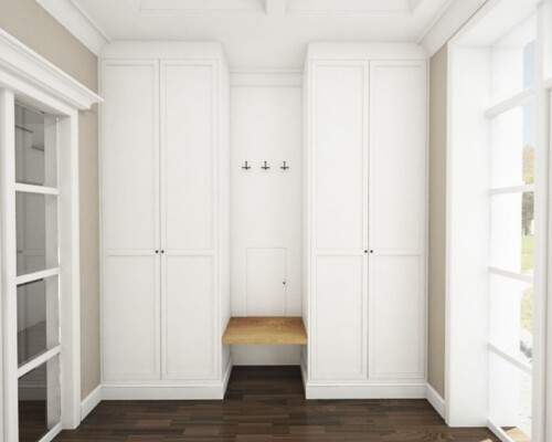 Sprytne przechowywanie w przedpokoju – szafa na wymiar zintegrowana z praktycznym siedziskiem. Przedpokój z dużą, białą szafą wnękową z wyciętą niszą do siedzenia.