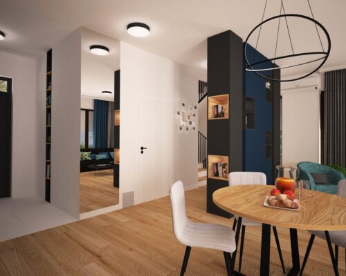 Światło wskazuje drogę – designerska lampa jako rzeźbiarski detal w minimalistycznym korytarzu. Jasny korytarz z drewnianą podłogą i nowoczesną lampą wiszącą, prowadzący do jadalni.