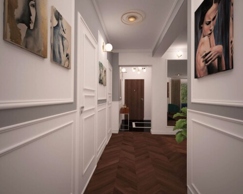 Ponadczasowa elegancja w strefie wejściowej – klasyczny korytarz z białą sztukaterią. Elegancki, długi korytarz z białą boazerią angielską, drewnianą podłogą i stylowymi kinkietami.