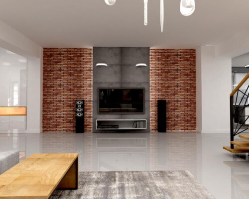 Aranżacja strefy telewizyjnej w salonie, gdzie industrialna surowość cegły i betonu spotyka się z ciepłem naturalnego drewna. Nowoczesny salon ze ścianą RTV z czerwonej cegły i betonu architektonicznego, z drewnianym stolikiem kawowym i systemem audio.