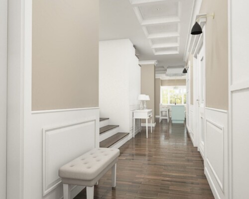 Witaj w domu – minimalistyczny i pełen światła przedpokój jako zapowiedź stylu całego wnętrza. Jasny i przestronny przedpokój z białą ścianą, drewnianą podłogą i widokiem na salon.