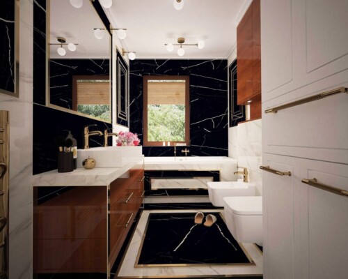 Siła kontrastu – eleganckie połączenie białych, gładkich frontów z czarnym, matowym blatem. Zbliżenie na minimalistyczną, białą kuchnię z wbudowanym piekarnikiem i czarnym, kamiennym blatem.