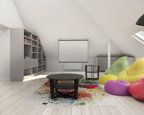 Relaks i lektura w jednym – aranżacja salonu, która łączy komfort z pasją do książek. Jasny salon z białą sofą, kolorowymi pufami i dużą, białą biblioteką na ścianie w tle.