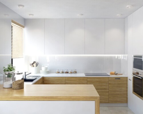Funkcjonalna kuchnia z białymi frontami i drewnianym blatem – projekt wnętrza w stylu skandynawskim Nowoczesna minimalistyczna kuchnia w bieli z drewnianymi akcentami