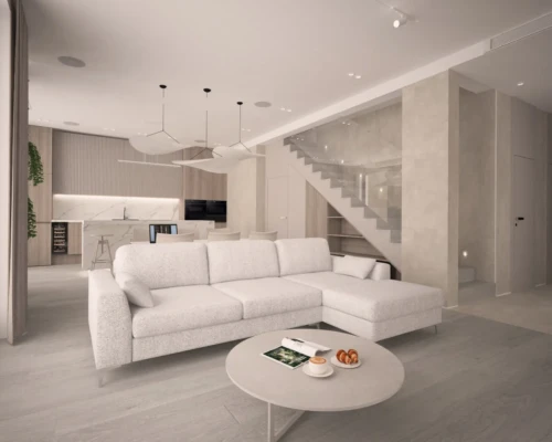 Otwarte wnętrze – salon i kuchnia w jednej harmonii Salon z białym narożnikiem, stolikiem kawowym i otwartą kuchnią