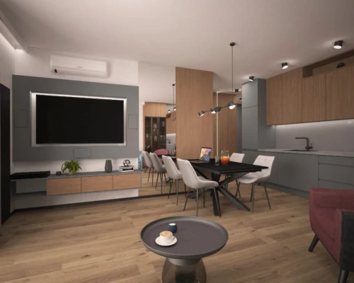 Przestrzeń do życia – telewizor, kuchnia i wypoczynek w jednym miejscu Salon z telewizorem, nowoczesną kuchnią i drewnianą podłogą – projekt mieszkania