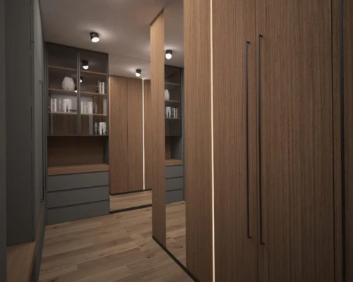 Garderoba w ciepłym wykończeniu – komfort i styl Garderoba z ciemnymi i drewnianymi frontami oraz subtelnym oświetleniem