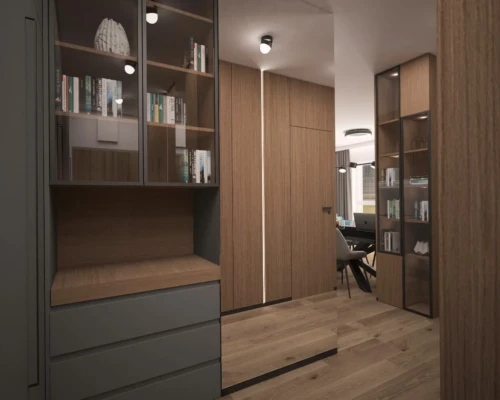 Elegancka garderoba – przejrzystość i wygoda Garderoba z szufladami, przeszklonymi witrynami i podświetleniem – projekt mieszkania